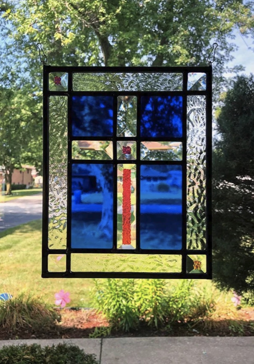 Blue cross stained glass panel