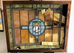 Damaged stained glass panel before repair
